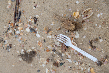Plastic forks left on the beach