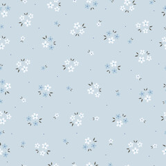 White flower pattern on blue seamless background