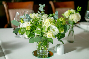 Table served for dinner in living room, close up view