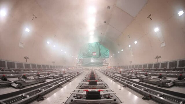 Cargo freighter inside aircraft with fog