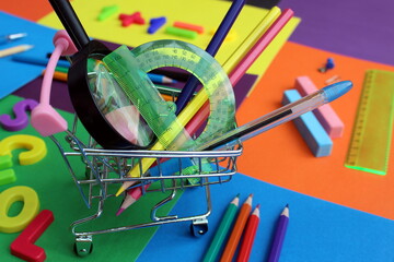 A small cart contains office supplies for the school
