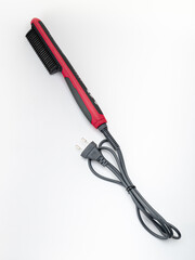 iron with a black and red comb
