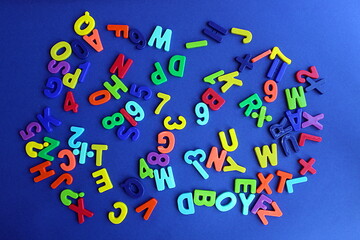Multicolored letters and numbers on a blue background