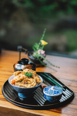 Food series: Tendon, crisp tempura laid over bowl of steamed rice