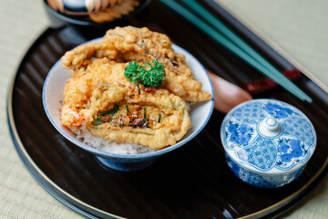 Food series: Tendon, crisp tempura laid over bowl of steamed rice