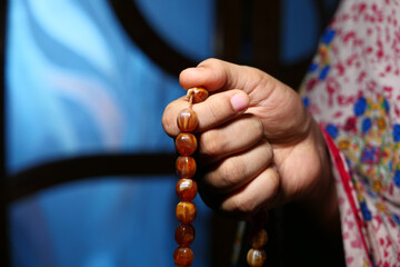 Close up of muslim women hand praying.