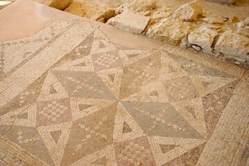 Detail from the damaged mosaic floor dating the late-3rd century AD at the Neolithic period Kourion Ancient city in Cyprus
