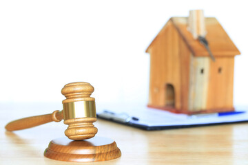 Property auction, Gavel wooden and model house on wtite background, lawyer of home real estate and ownership property concept