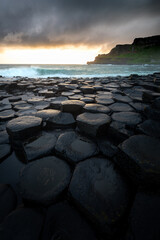 Giant's Causeway at sunrise with waves