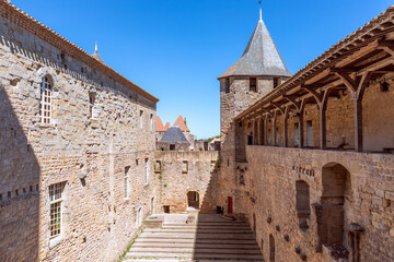 Naklejka premium Fortified wide walls and observation towers of the medieval castle of Carcassonne town