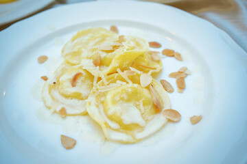 Italian traditional Ravioli over white plate. Healthy diet. Mediterranean cuisine.