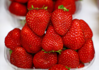 Close up red ripe strawberry on retail display