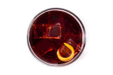Boulevardier cocktail and orange zest isolated on white background. Top view