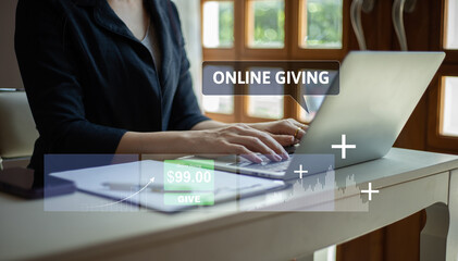 Asian woman using a computer with online giving concept.