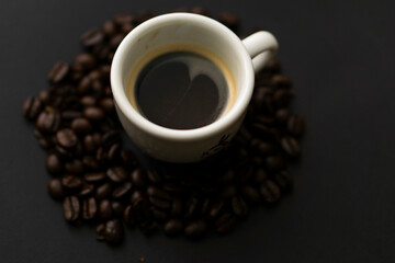 Delicious cup of coffee, with black background