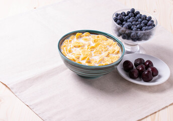 golden crispy corn flakes as breakfast concept