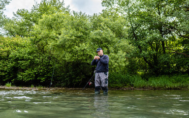 Fishermen by the river stock photo