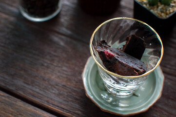 Thick Chocolate Brownie Mixed with dried strawberries Ready to serve in a glass cup
