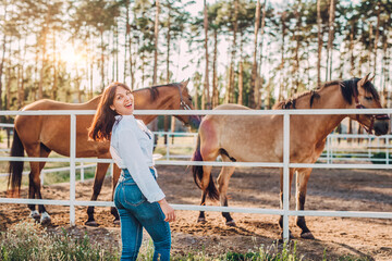 Professional horse riders riding horses slow motion. Women in helmets horseman. Summer activity, sports at hippodrome with protection. Brown bay horse racing, races betting