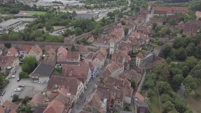 Aerial view of Bamberg old town, Bavaria, Germany. Ancient historic half-timbered buildings medieval houses with orange roofs. Beautiful cityscape. Summer. Wall around the town. Unesco heritage. High