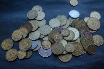 coins on a black background