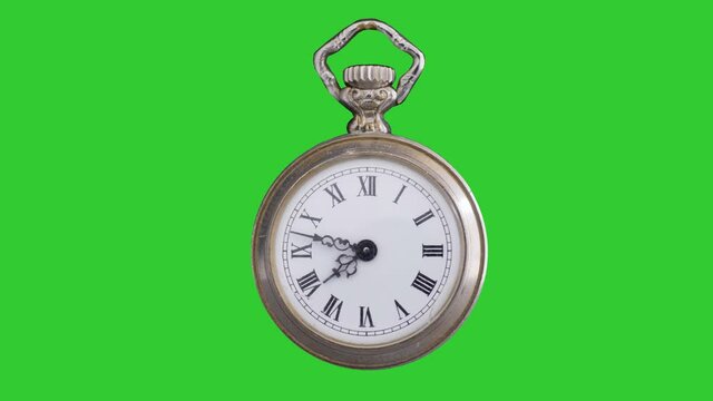Retro vintage pocket watch clock isolated on green chroma key background