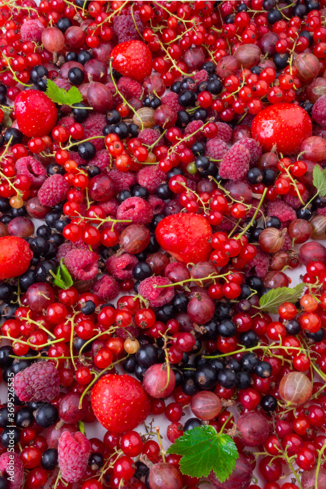 Poster background of ripe juicy different berries