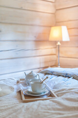 Fototapeta na wymiar lamp in bedroom with a tea set