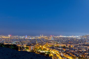 View of Barcelona city and costline in spring from the Bunkers in Carmel in the night.