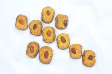 the yellow biscuit with almond isolated on white background.