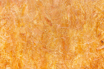 OSB plywood or oriented strand board, wood wall background texture
