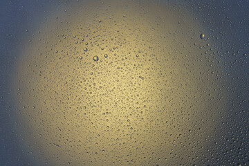 Close-up of water drops on glass . Abstract background texture.