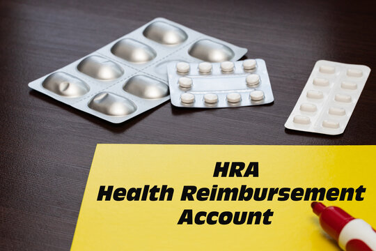 Health Reimbursement Account HRA, the text is written on a yellow sheet.
