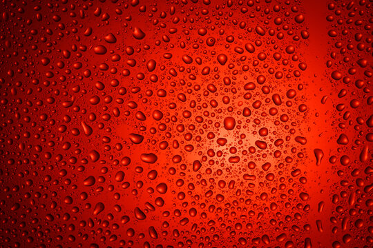 Close-up of water drops on glass . Abstract background texture.