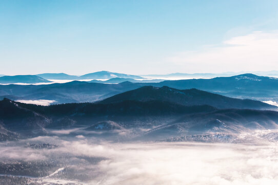 Panoramic view of Mountain Shoria with a cloud in the foreground, Siberia