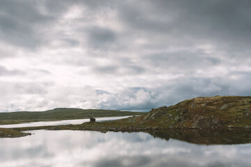 Deserted shore of a high mountain lake in Norway