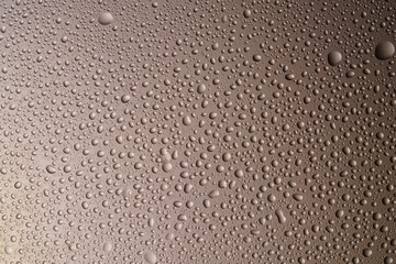 Close-up of water drops on glass . Abstract background texture.