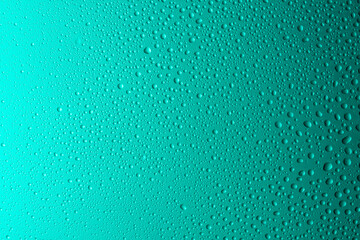 Close-up of water drops on glass . Abstract background texture.