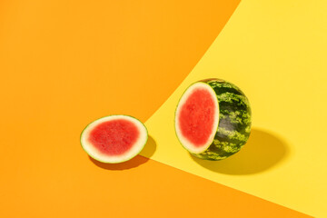 Watermelon isolated on colorful abstract background. Sliced watermelon creative layout