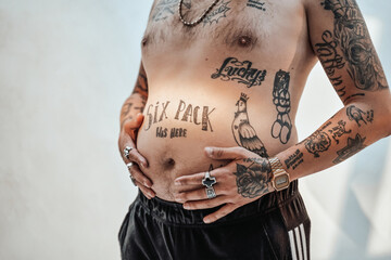 Crazy gangster with rings and spends hours stroking his thick belly with freaky and humorous tattoos