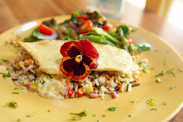 Omelette breakfast with a side of rice and salad. Healthy breakfast concept