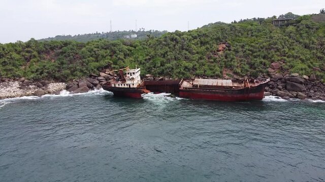 The rusty shipwreck run aground. Sri Lanka