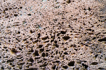 Close up of natural pumice stone texture . Porous pumice abstract background.