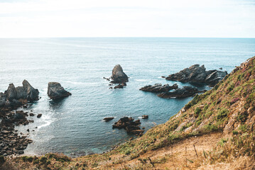 Landscape of a rocky cliff to the sea