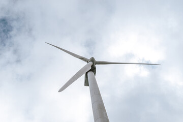 Wind turbine against sky