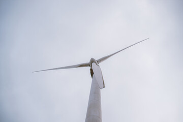 Wind turbine against sky