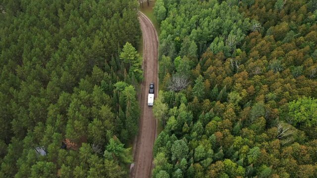 Truck driving through the woods in Northern Michigan