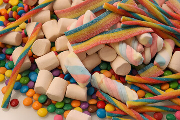 Different sweets decorating a beautiful party table.