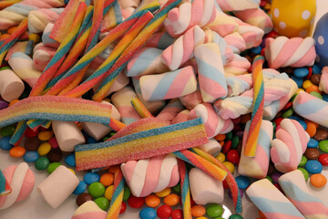Different sweets decorating a beautiful party table.