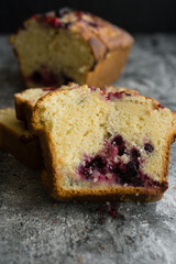 Loaf cake with red berries on the table